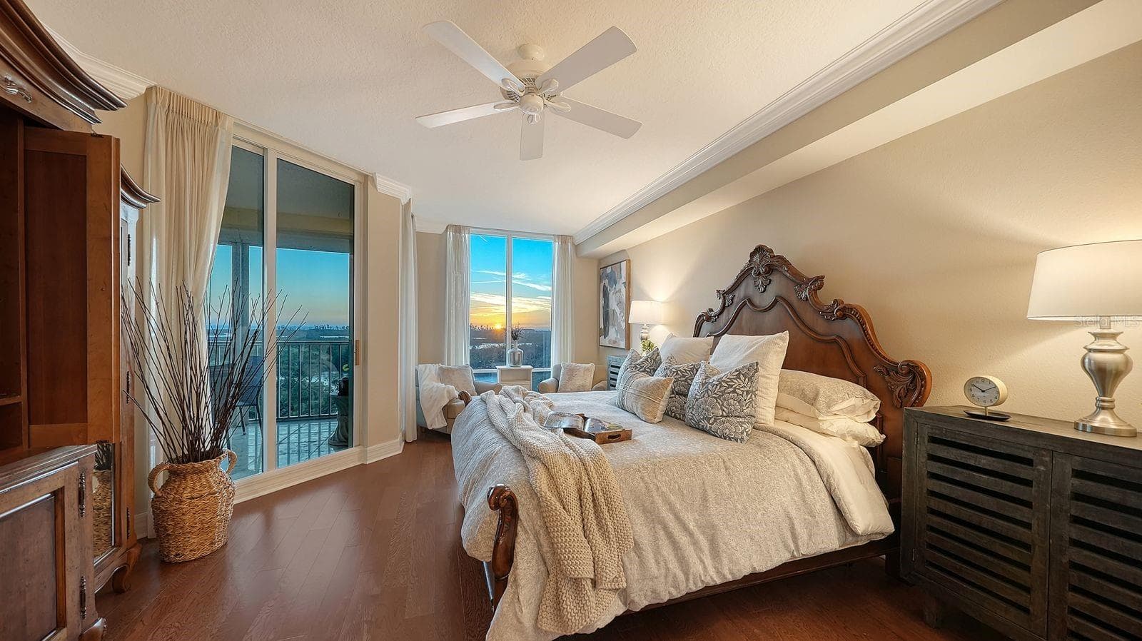 Primary suite with waterfront vistas and sliding doors to lanai - 385 NORTH POINT RD #701, OSPREY