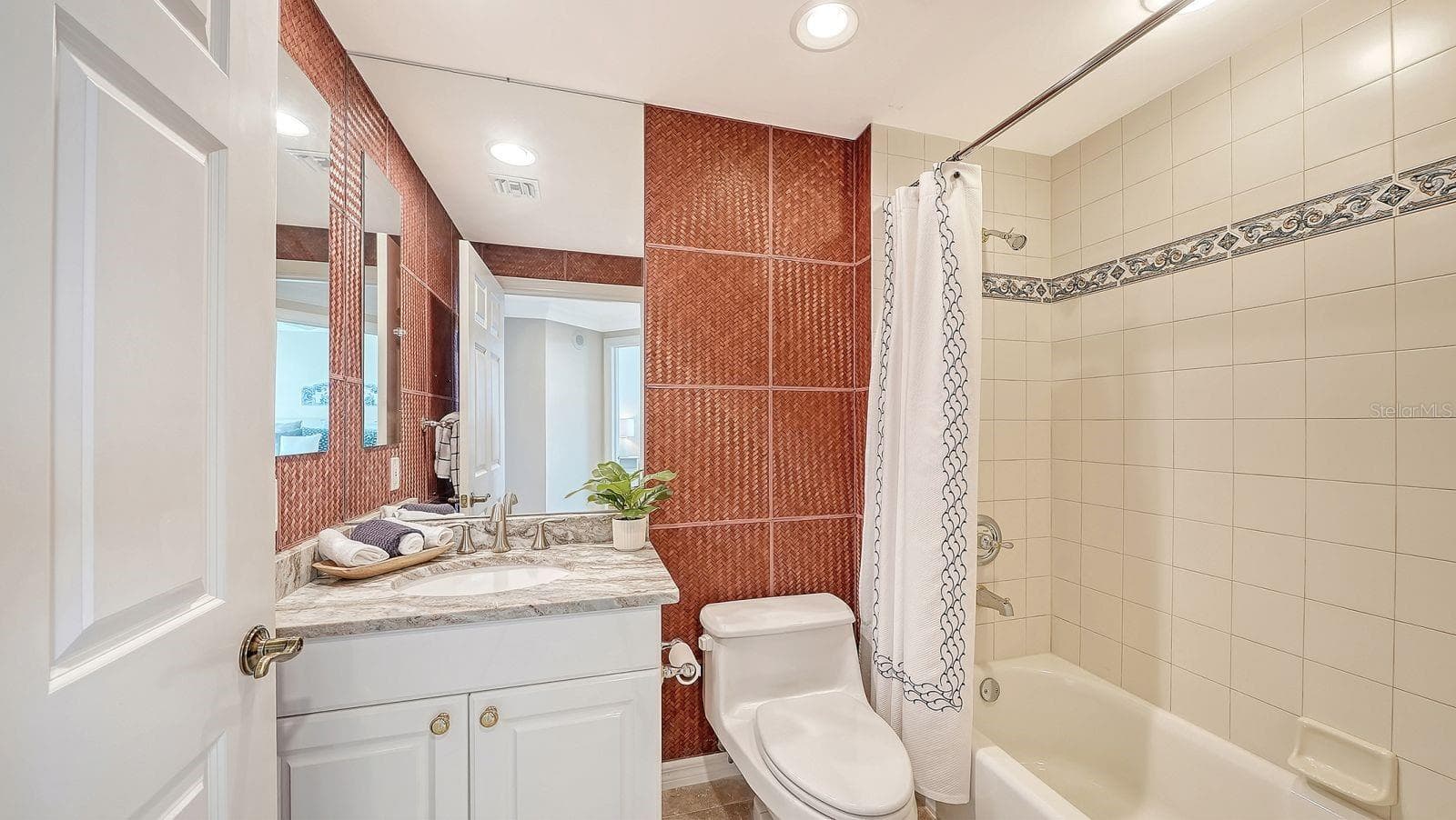 Guest bath off of hallway next to Bedroom 3 - 385 NORTH POINT RD #701, OSPREY