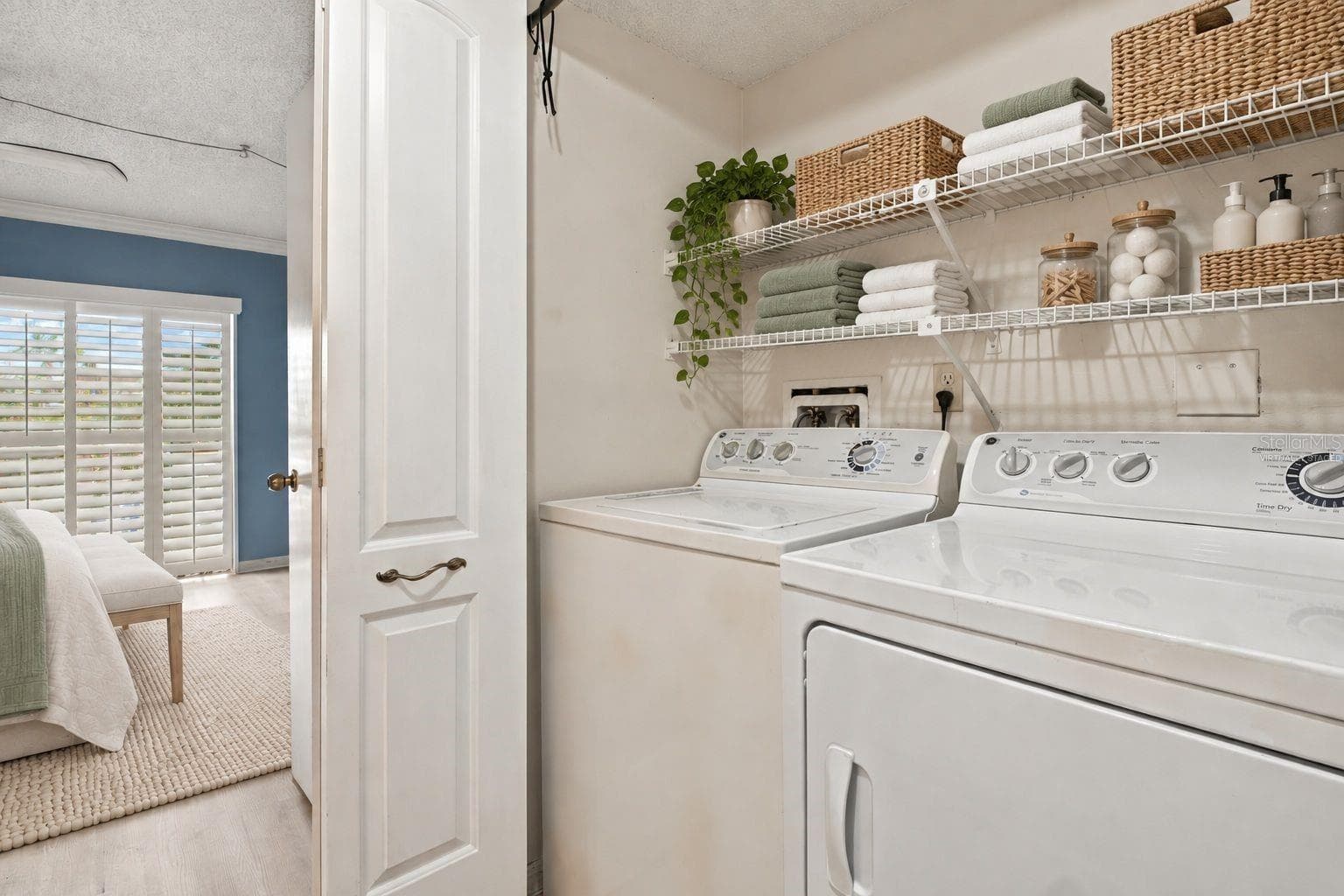 Virtually staged Laundry closet - 544 PINELLAS BAYWAY S #F8, TIERRA VERDE