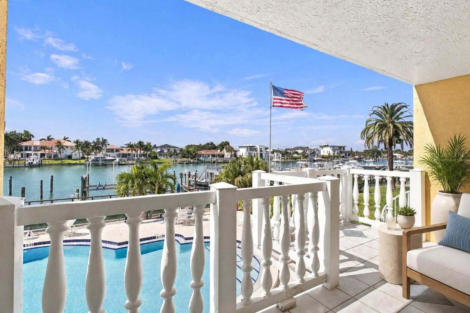 Virtually staged Balcony view from living room - 544 PINELLAS BAYWAY S #F8, TIERRA VERDE