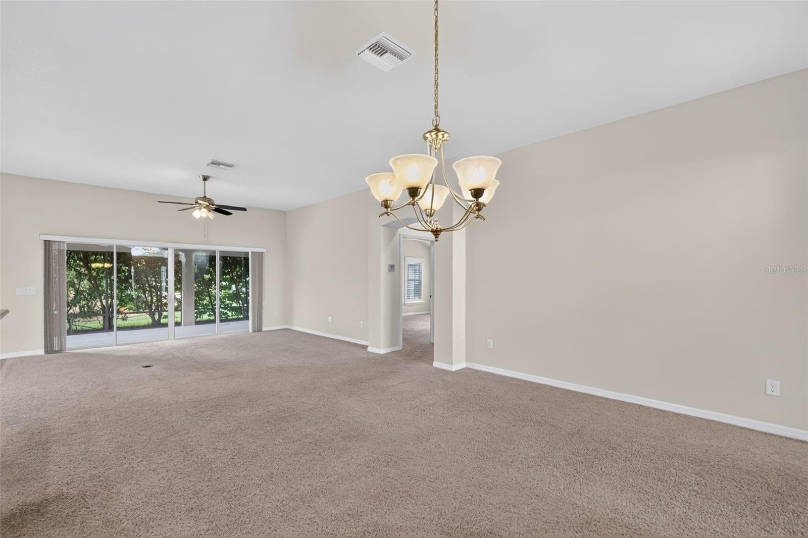 Living and Dining Rooms - 3376 MAYFLOWER LOOP, THE VILLAGES