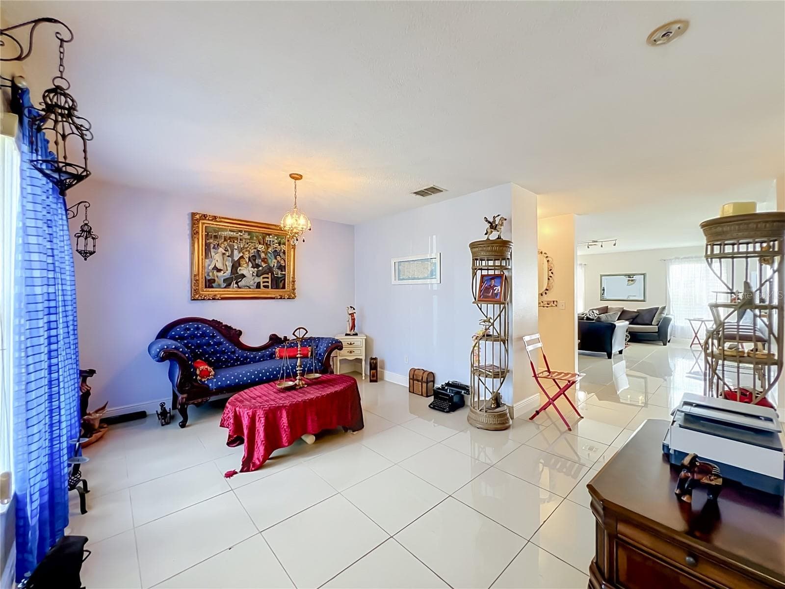 Living room is at the front of the house - 12900 LOS ALAMITOS CT, ORLANDO