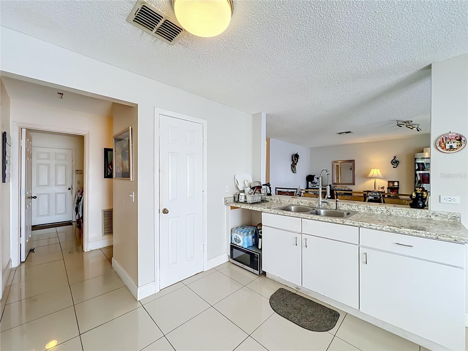 kitchen with closet pantry - 12900 LOS ALAMITOS CT, ORLANDO