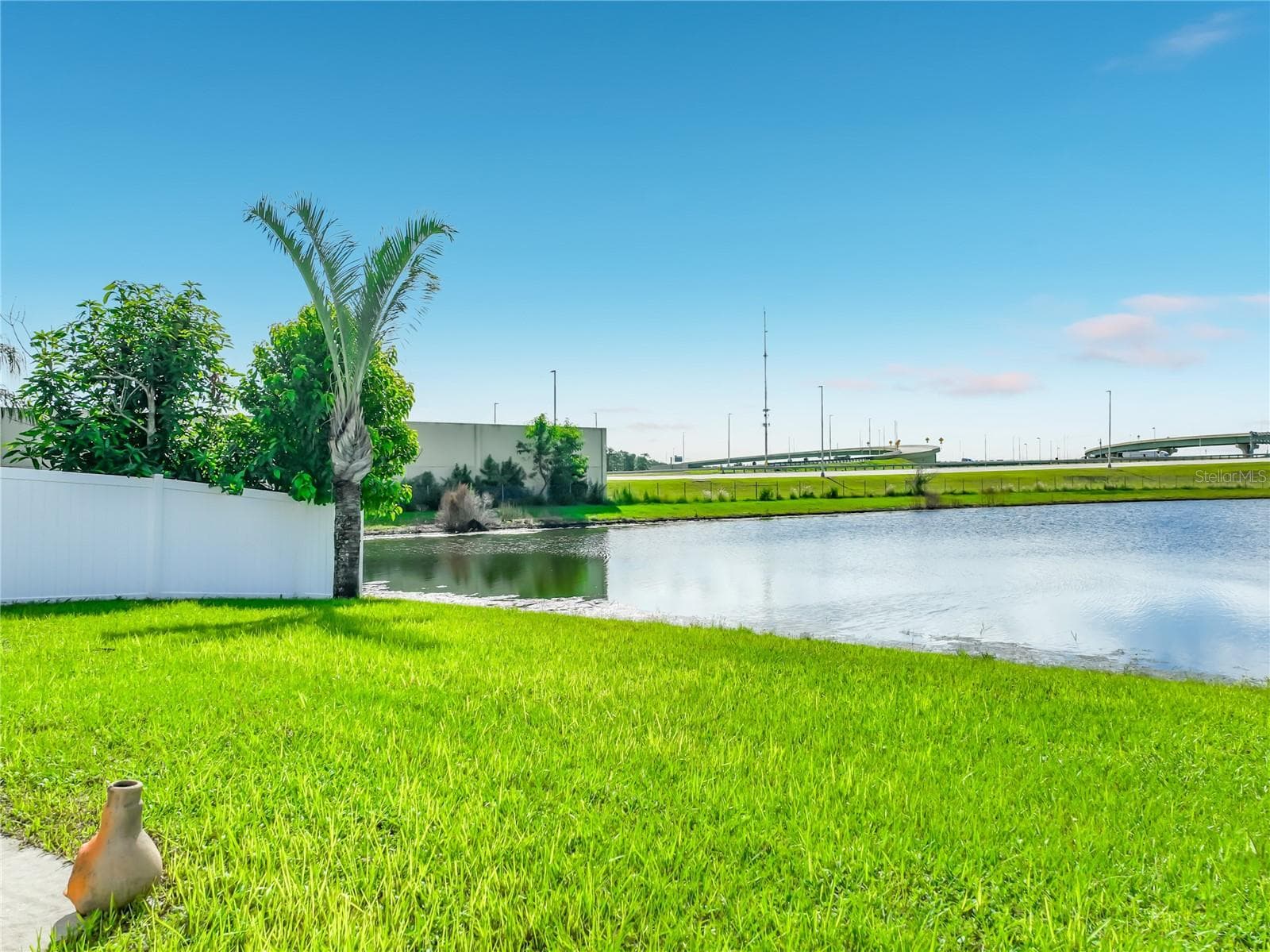 Back yard on pond front. So calming! - 12900 LOS ALAMITOS CT, ORLANDO