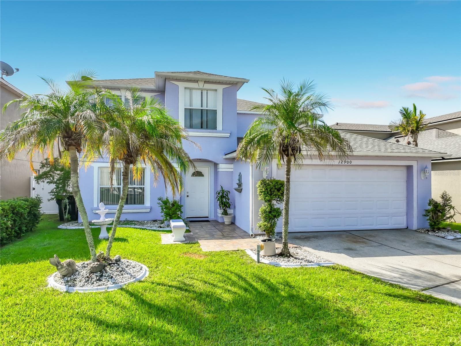 Front of the home. Gorgeous Palm trees! - 12900 LOS ALAMITOS CT, ORLANDO