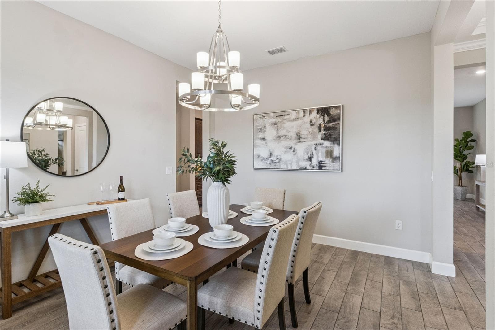 Dining room with chandelier, ready for holiday dinners and everyday meals. - 4108 VIA TOLEDO CT, POINCIANA