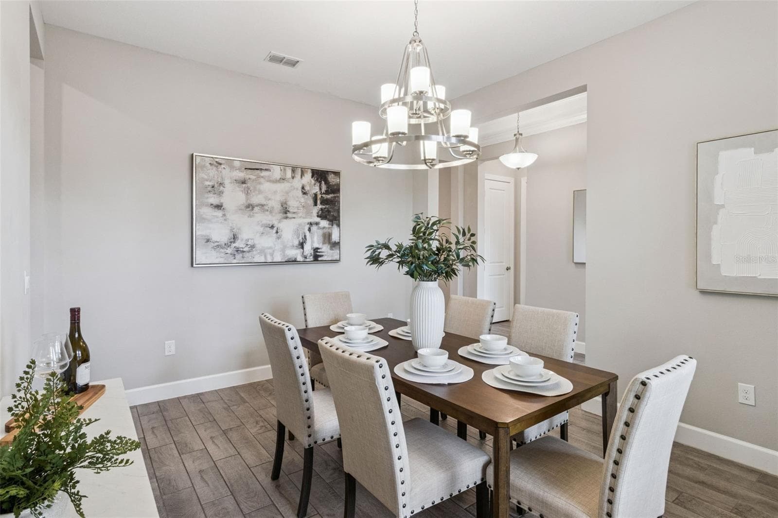 Alternate view of the separate dining room with abundant natural light. - 4108 VIA TOLEDO CT, POINCIANA