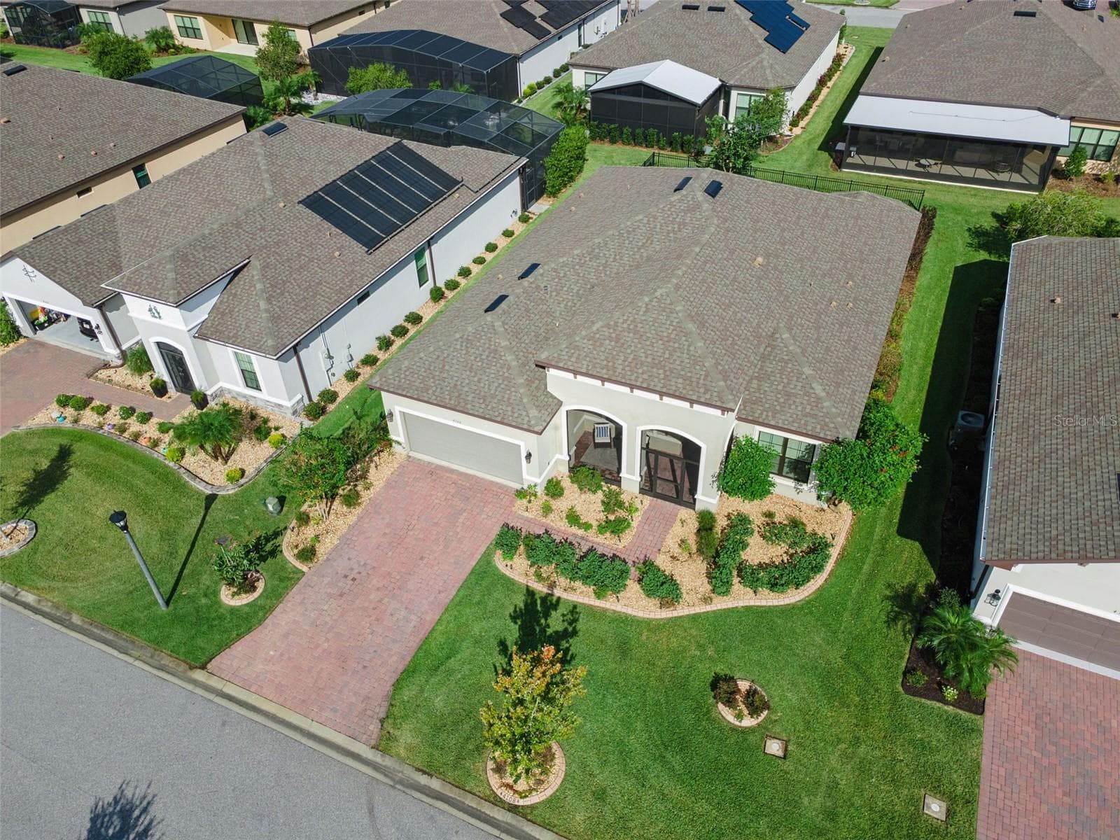 Aerial view of 4108 Via Toledo Ct in Solivita, a 55+ active adult community in Poinciana, FL. - 4108 VIA TOLEDO CT, POINCIANA