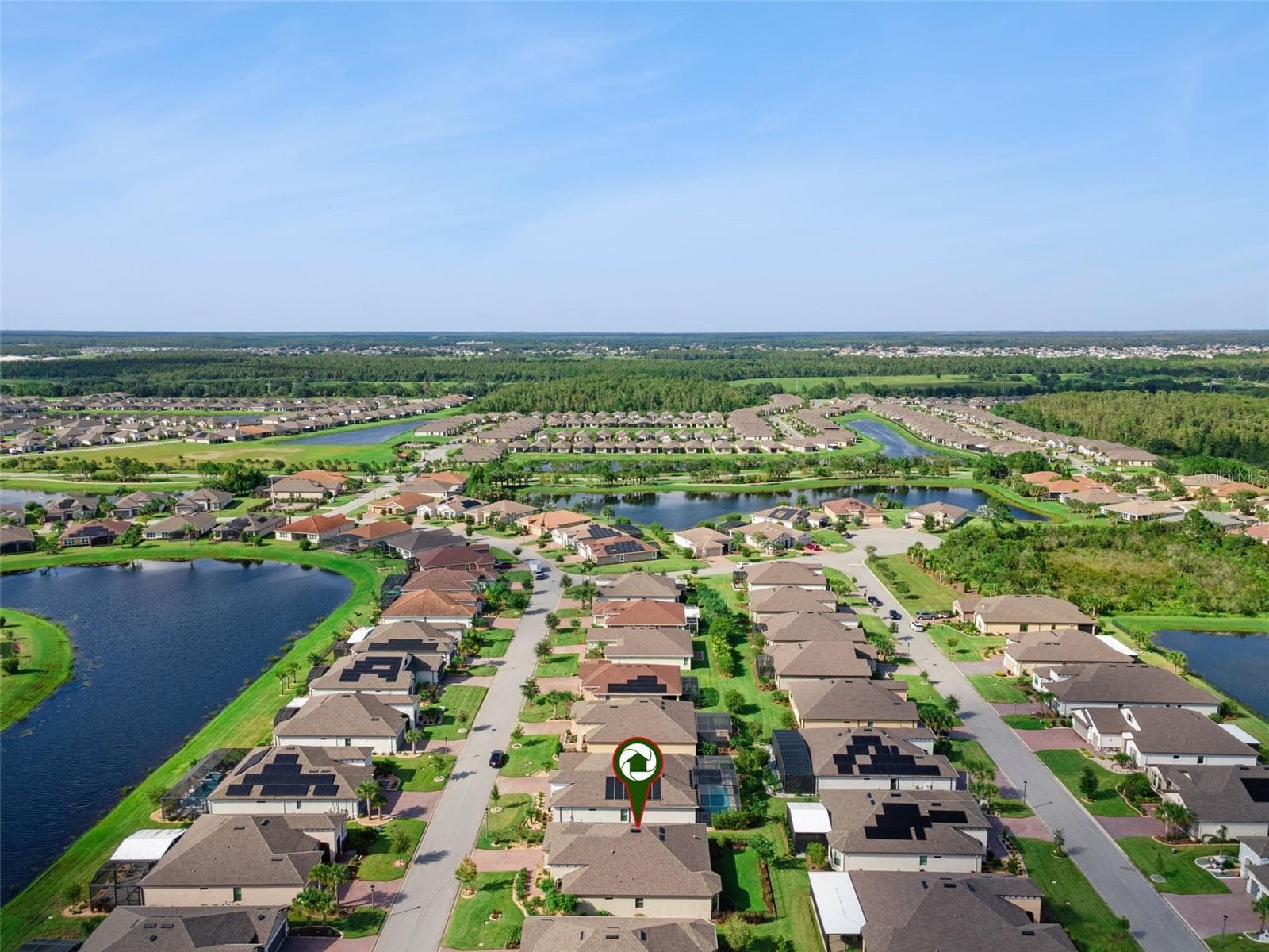 Aerial view of Solivita, one of the Orlando area's premier 55+ active adult communities, with scenic ponds and green space. - 4108 VIA TOLEDO CT, POINCIANA