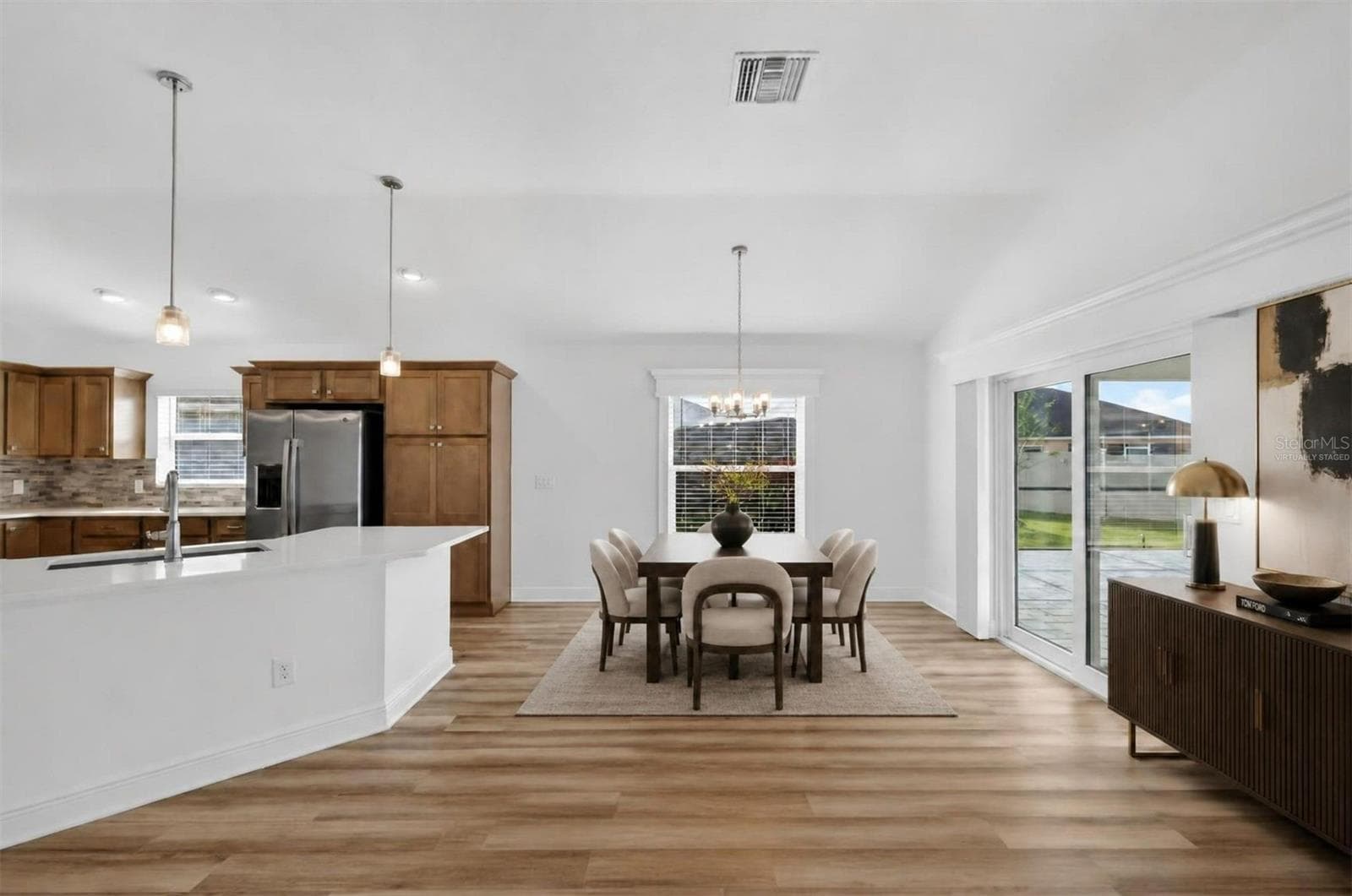 Kitchen and Dining Room-Virtually Staged - 6996 DWIGHT DR, THE VILLAGES