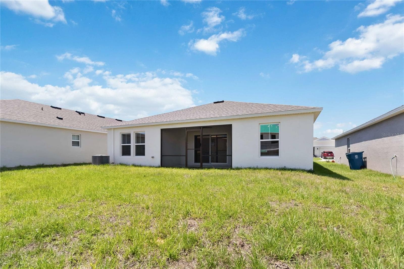 Back exterior - 2441 OAKWOOD LN, DAVENPORT