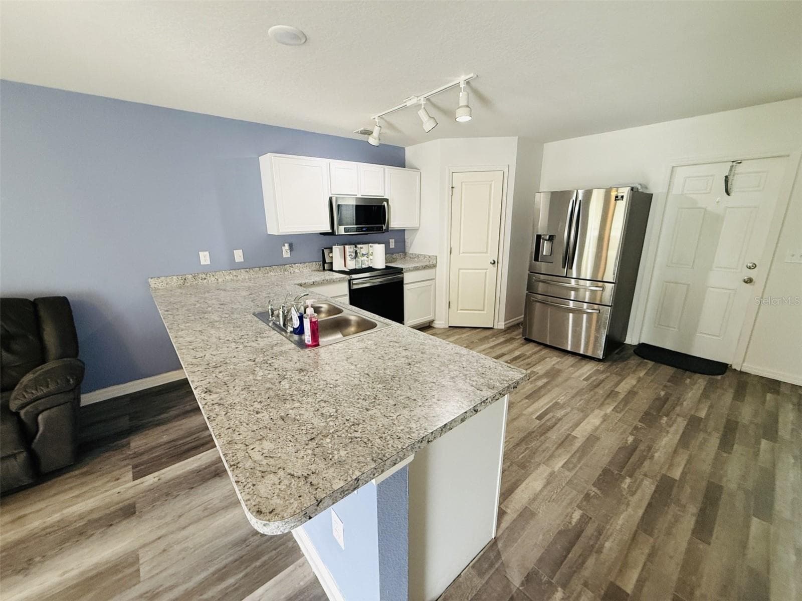 Single Family Residence at 12020 PINE WARBLER AVE, WEEKI WACHEE, photo 4 of 22