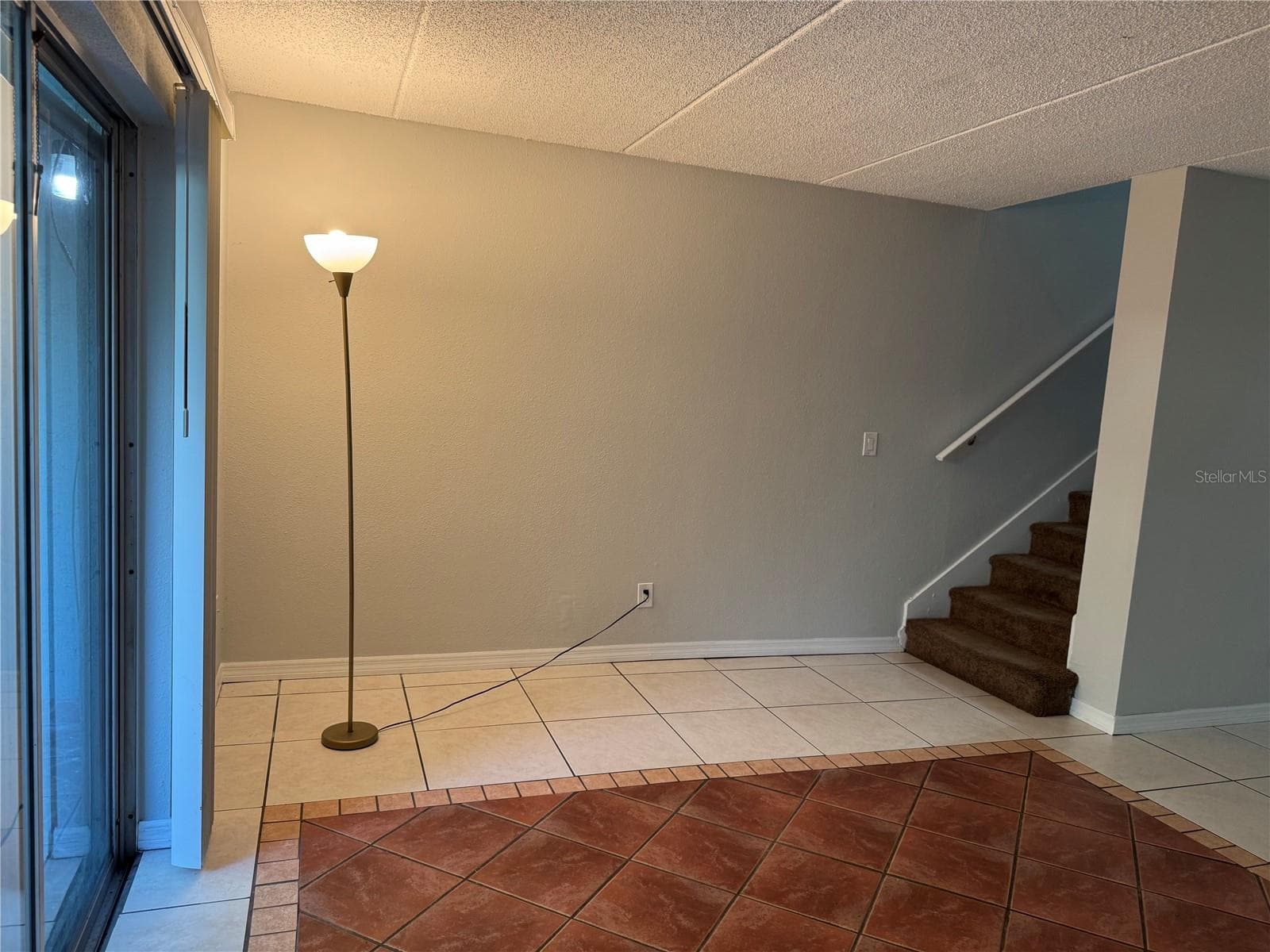 FROM REAR PATIO SLIDERS TO INTERIOR STAIRS TO 2ND FLOOR PRIVATE 2 BEDROOMS & FULL BATH - 2884 SOMERSET PARK DR #2907, TAMPA