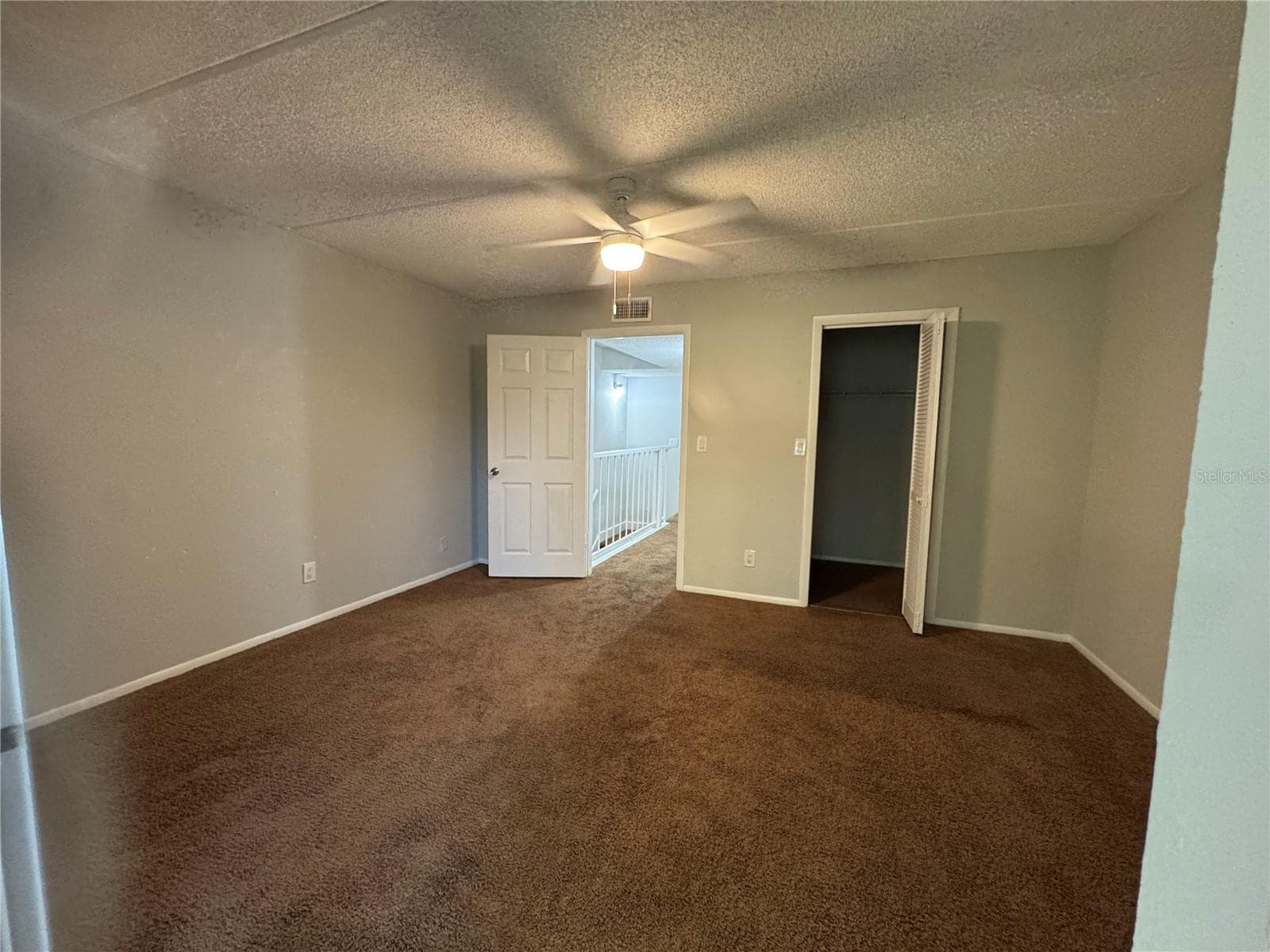 FROM OUTSIDE UPPER SERENITY BALCONY TO PRIMARY BEDRM DOOR - 2884 SOMERSET PARK DR #2907, TAMPA