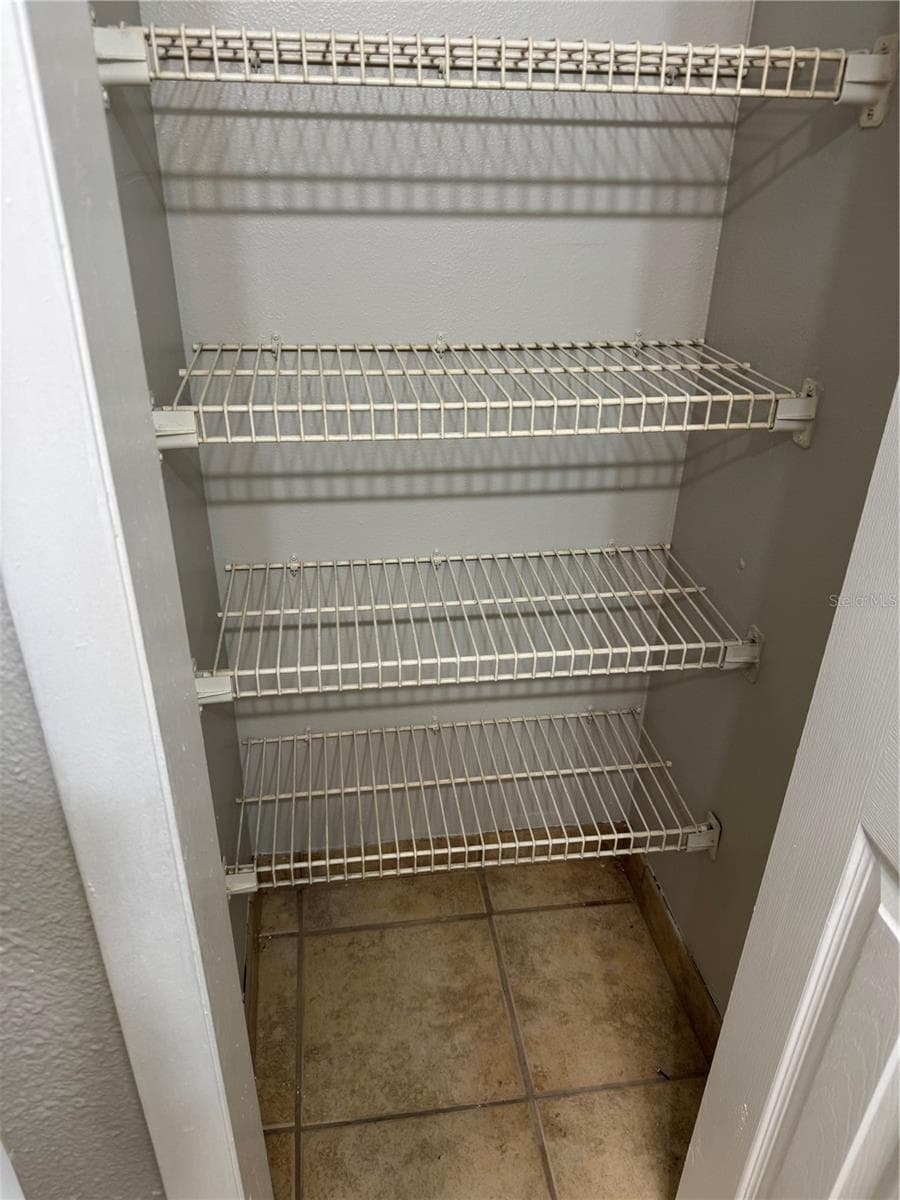 PRIMARY FULL BATH LINEN CLOSET - 2884 SOMERSET PARK DR #2907, TAMPA