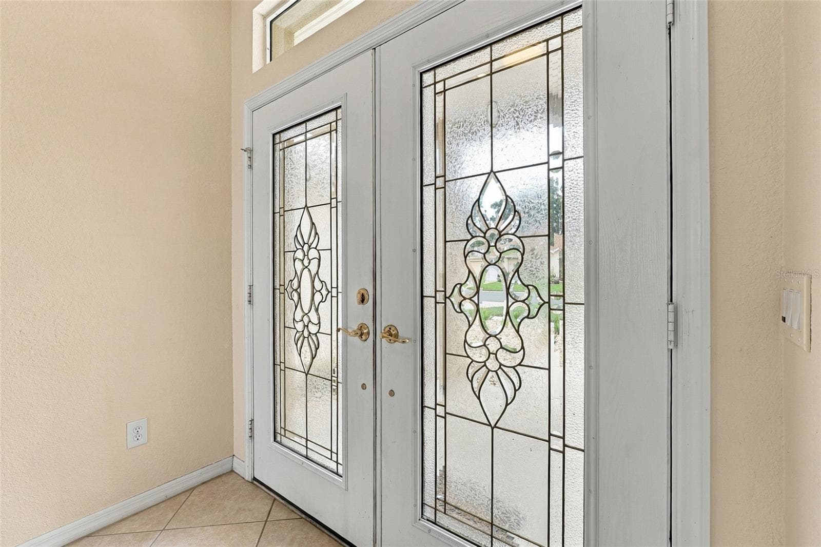 Inside double lead glass doors - 11811 SE 91ST CIR, SUMMERFIELD