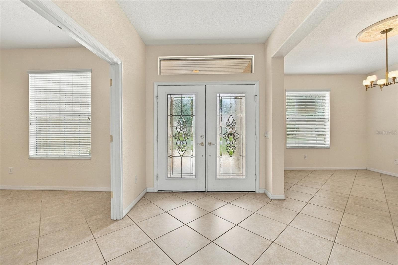 straight view entry and dining room - 11811 SE 91ST CIR, SUMMERFIELD