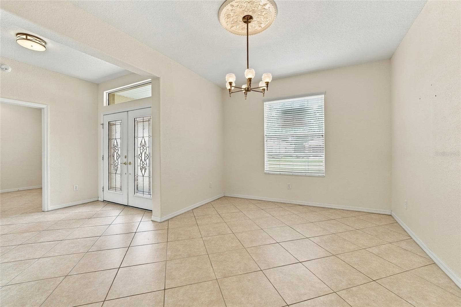 Dining room and entry - 11811 SE 91ST CIR, SUMMERFIELD