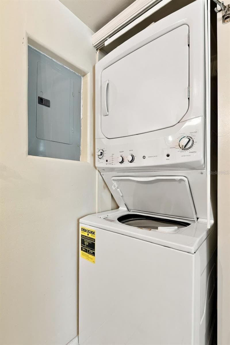 Stacked laundry in bathroom! - 1799 N HIGHLAND AVE #159, CLEARWATER