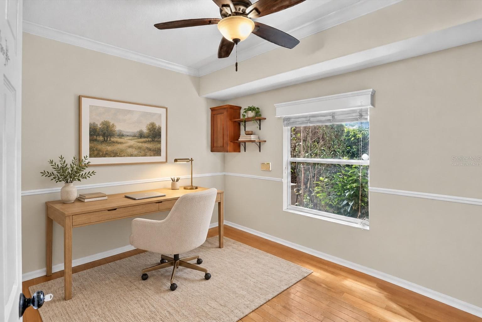 Virtually staged: Private office with natural light and wood flooring. - 2109 WEMBLEY PL, OVIEDO