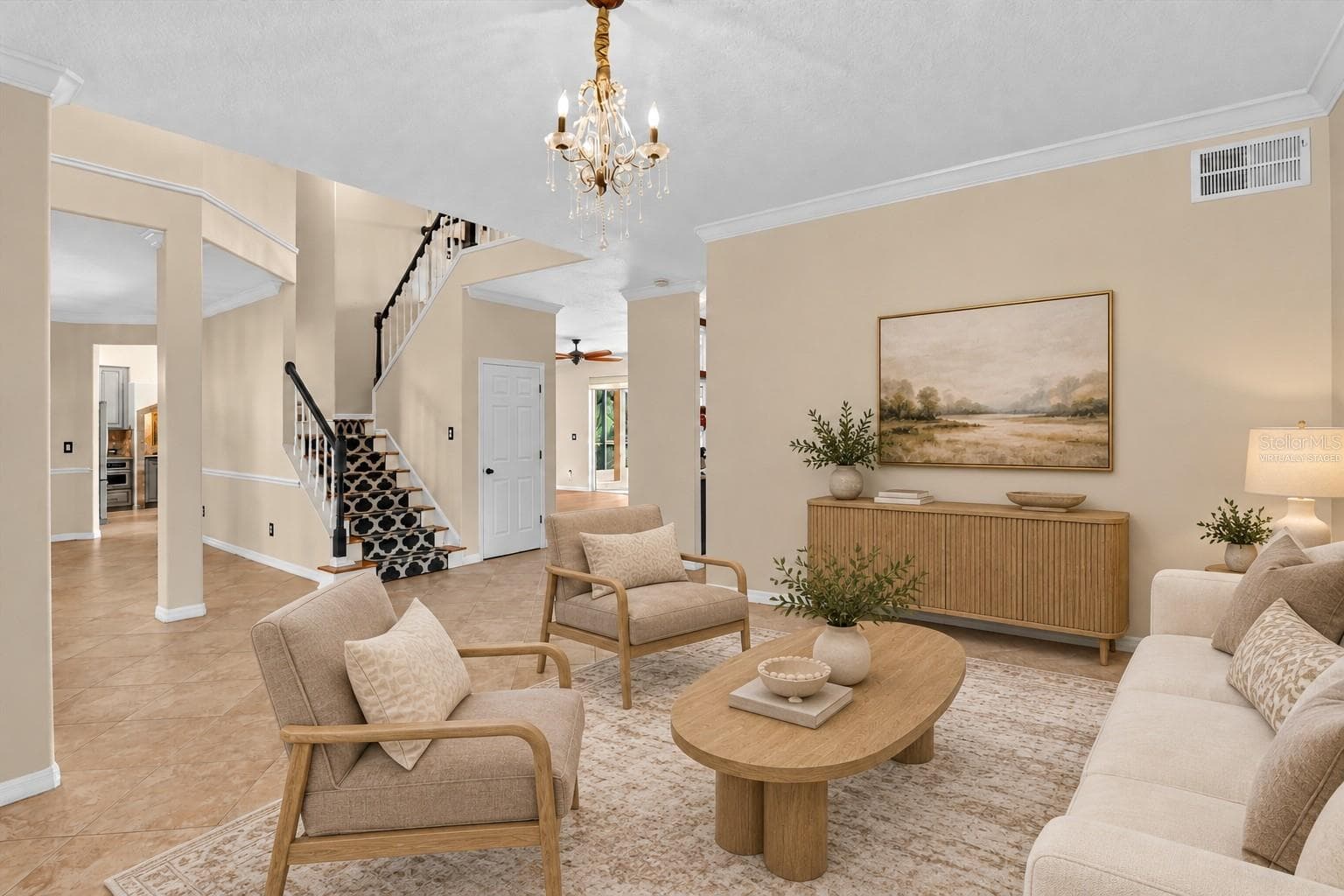 Virtually staged: Alternate sitting-room view toward the staircase. - 2109 WEMBLEY PL, OVIEDO