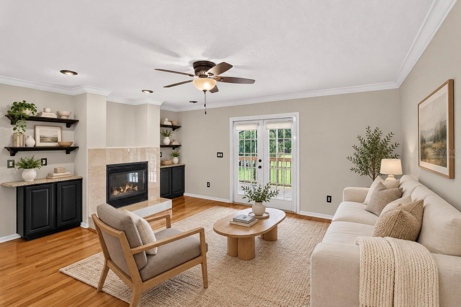 Virtually staged: Loft with a fireplace and built-in shelving. - 2109 WEMBLEY PL, OVIEDO