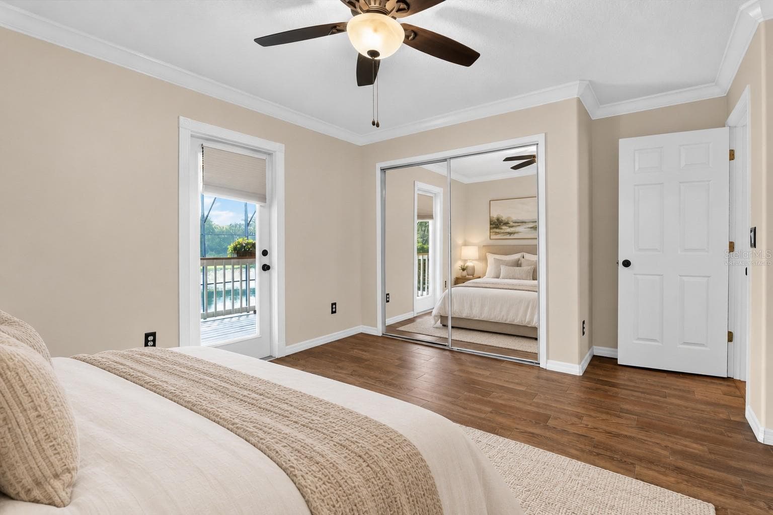 Virtually staged: Bedroom showing its connection to the adjoining bathroom. - 2109 WEMBLEY PL, OVIEDO