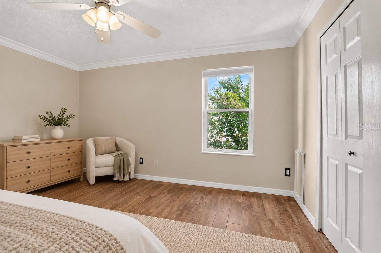 Virtually staged: Alternate bedroom view showing the window and closet. - 2109 WEMBLEY PL, OVIEDO