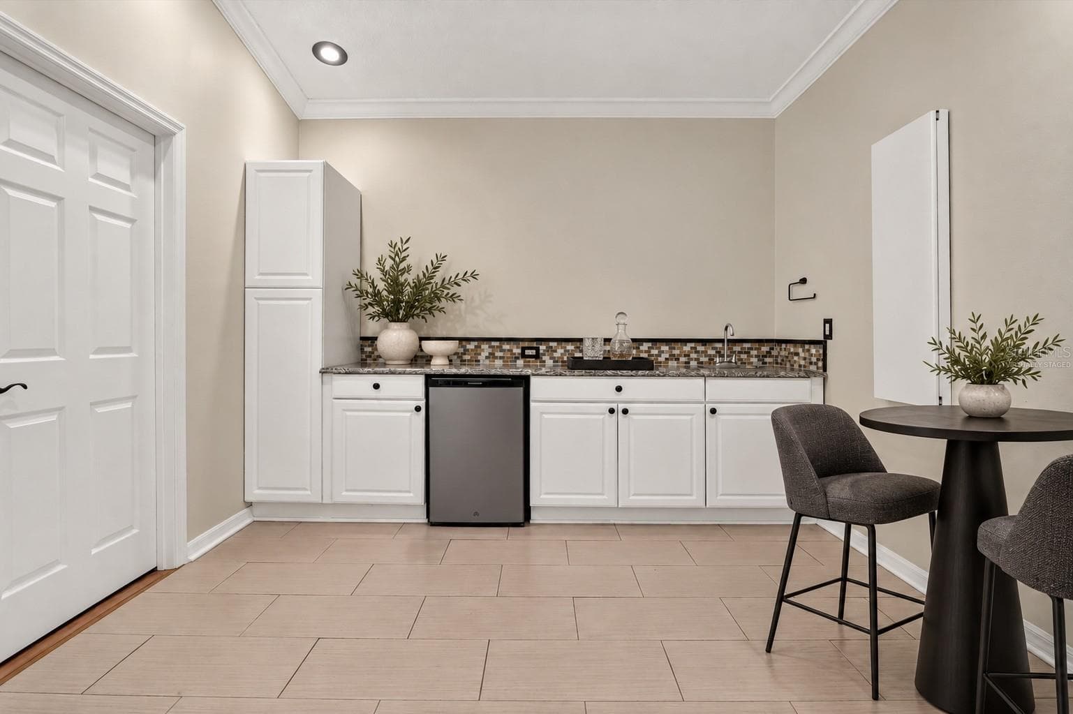 Virtually staged: Bonus-room wet bar and entertaining space. - 2109 WEMBLEY PL, OVIEDO