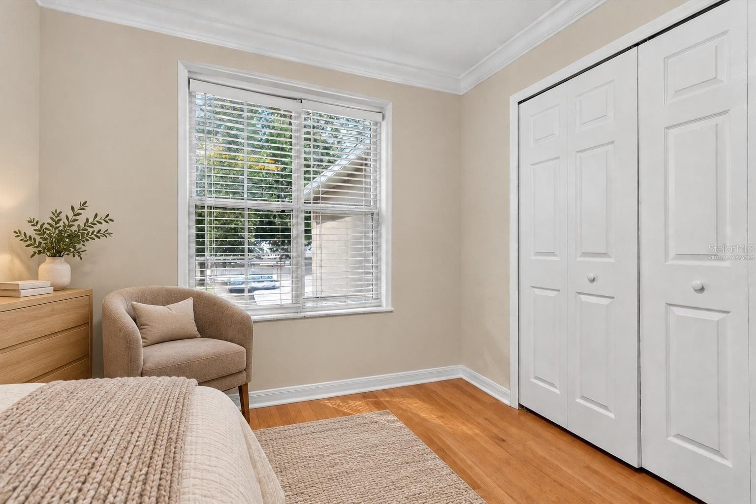 Virtually staged: Alternate bedroom view toward the window and closet. - 2109 WEMBLEY PL, OVIEDO