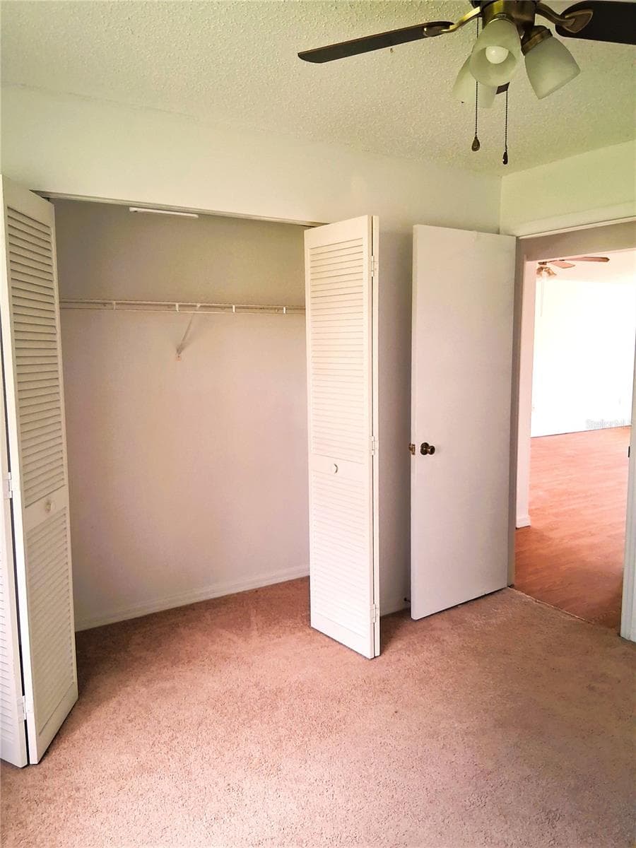 Bedroom II closet space - 21617 SW PEACH BLOSSOM ST, DUNNELLON