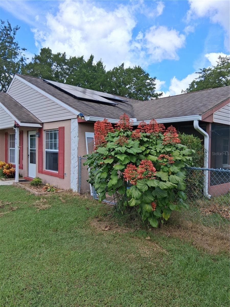 Bush right front and east side solar panels - 21617 SW PEACH BLOSSOM ST, DUNNELLON