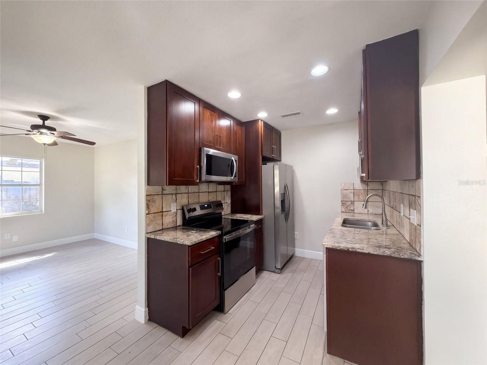 Single Family Residence at 1610 STEVENSONS DR, CLEARWATER, photo 6 of 20