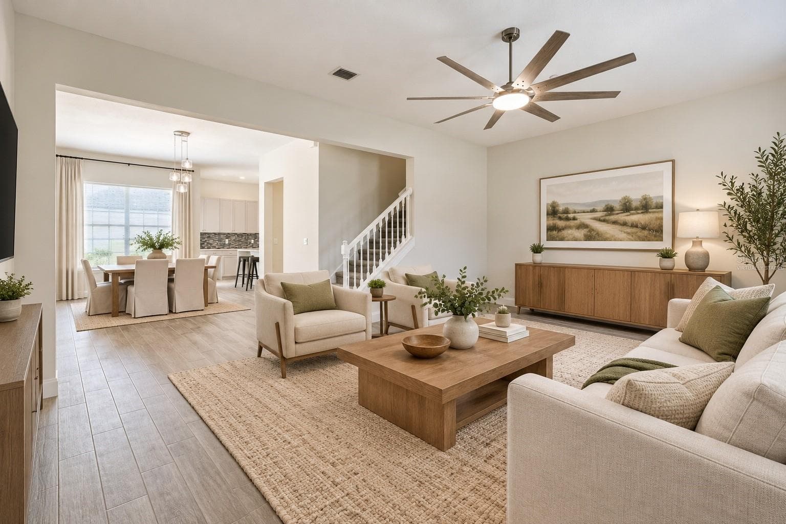 Living Room to Dining Room - Virtually Staged - 319 CELEBRATION BLVD, CELEBRATION