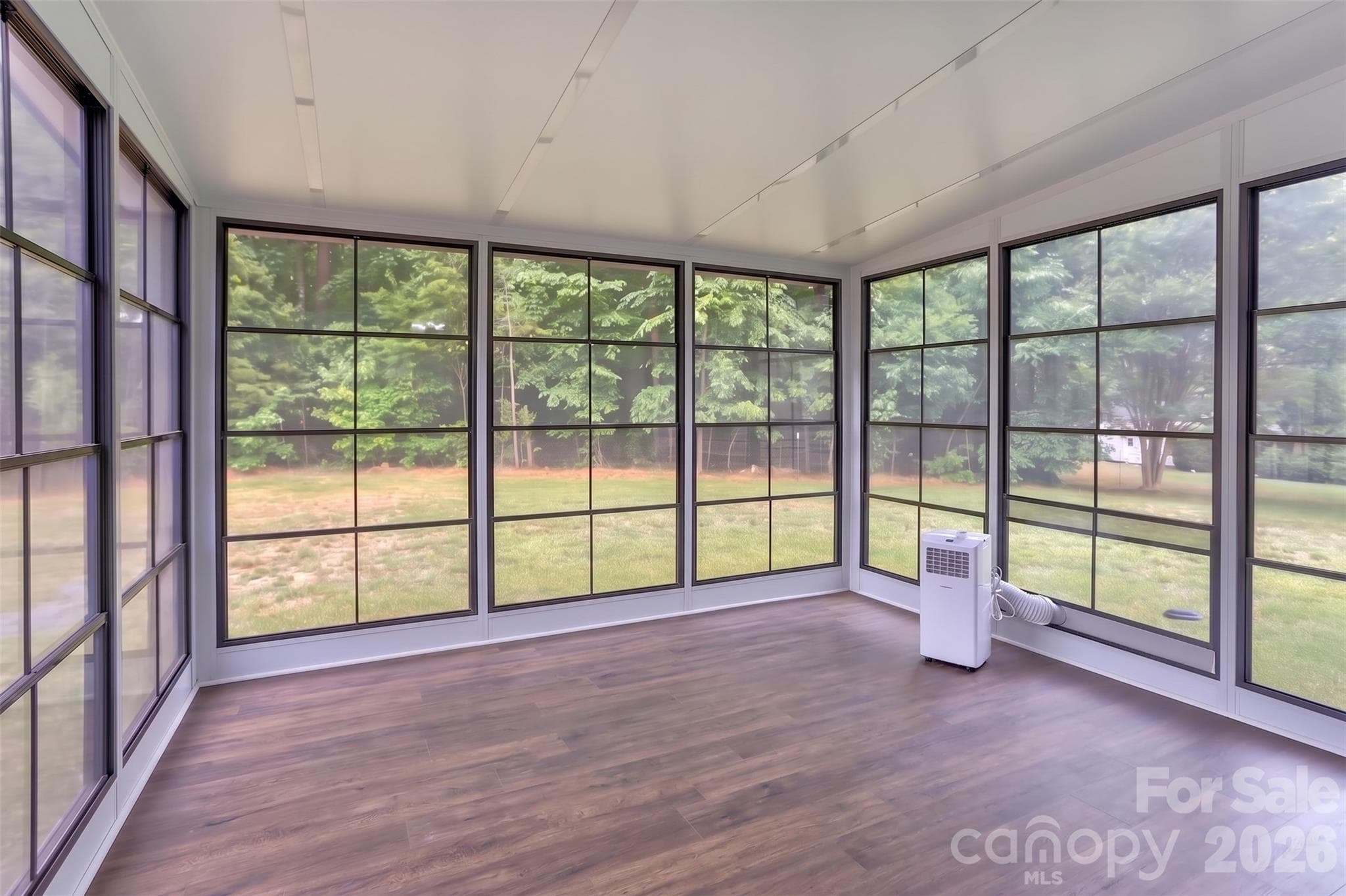 Highlight of the main level! Sunroom added in 2024 off the kitchen with portable AC unit and screens for cool, fall evenings. - Salisbury