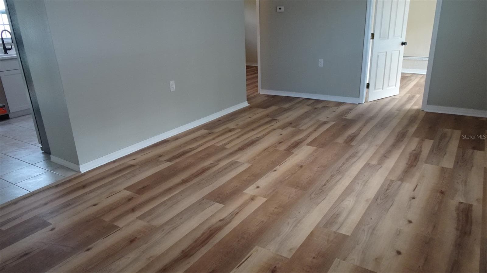 Look at these brand new luxury vinyl plank floors - 7809 38TH TER N, ST PETERSBURG