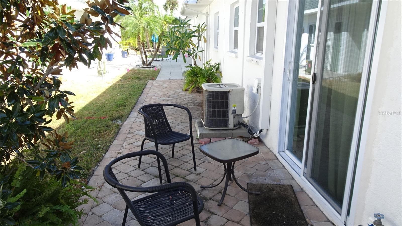 All of the pavers belong to this unit. - 7809 38TH TER N, ST PETERSBURG