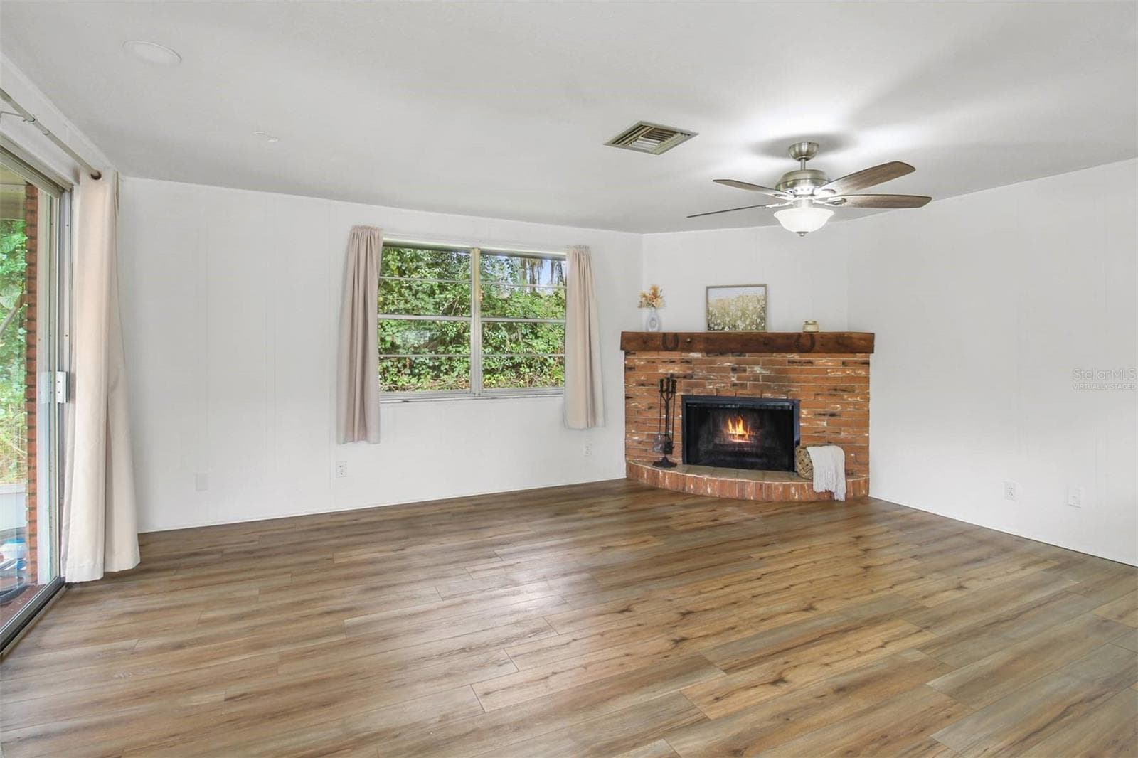 virtually staged fire - 5675 S SANDALWOOD WAY, FLORAL CITY
