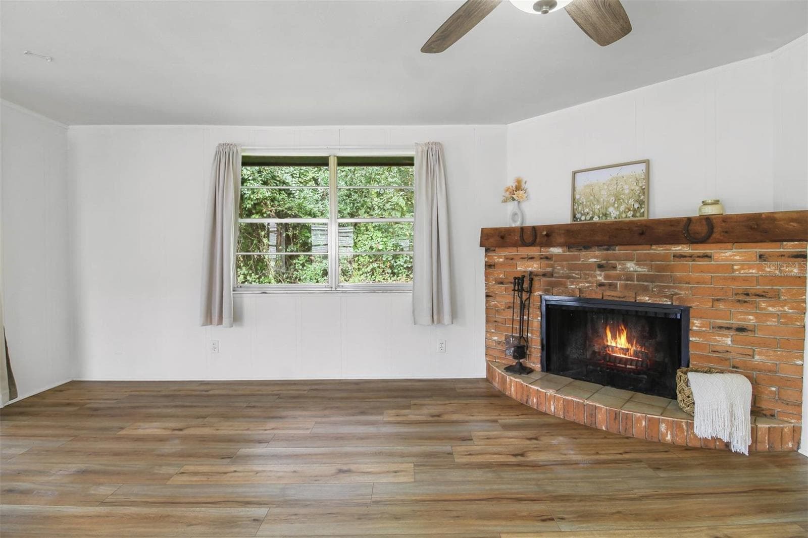 virtually staged fire - 5675 S SANDALWOOD WAY, FLORAL CITY