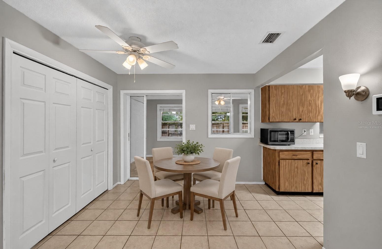VIRTUALLY STAGED Dinett area - 1305 ORANGE AVE, TAVARES