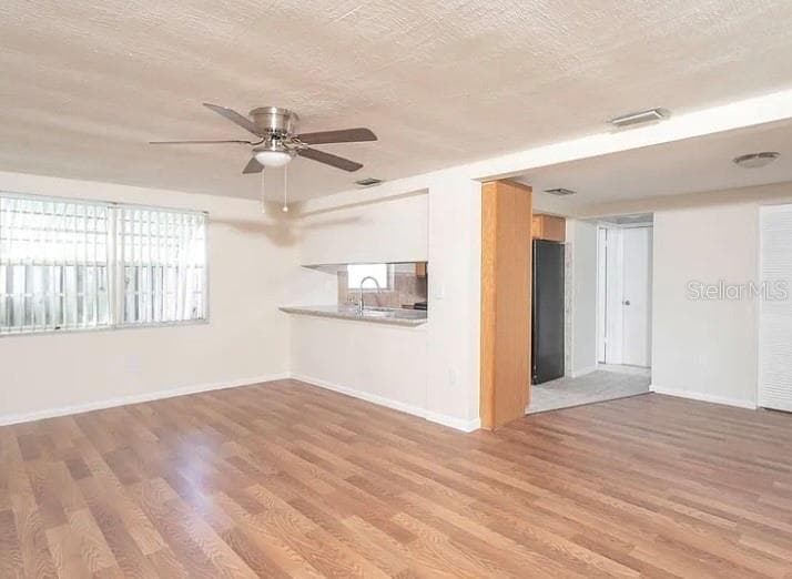 Family room before ceiling water damage - 8952 STERLING LN, PORT RICHEY