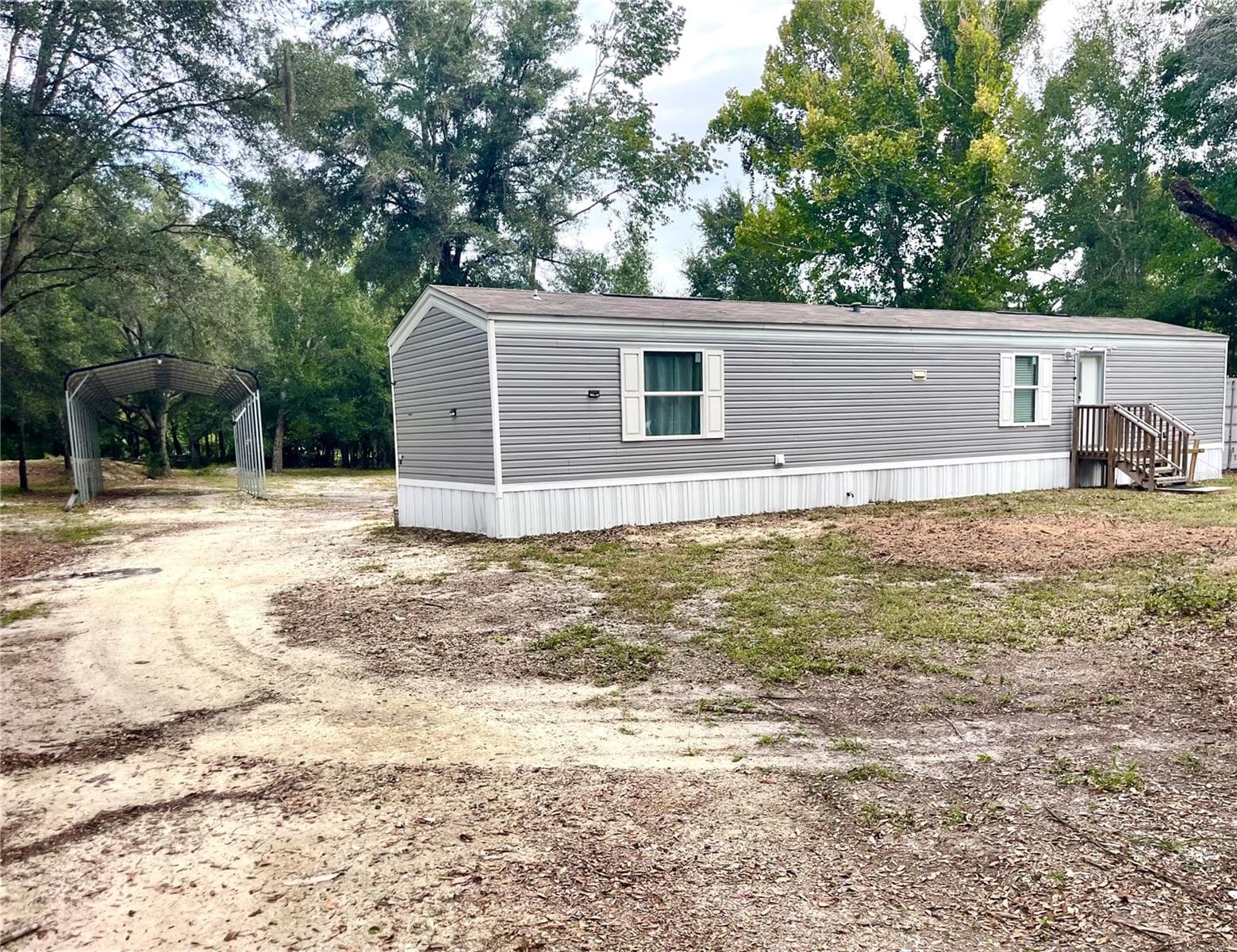 Manufactured Home at 7231 NW 28TH LN, CHIEFLAND, photo 3 of 41