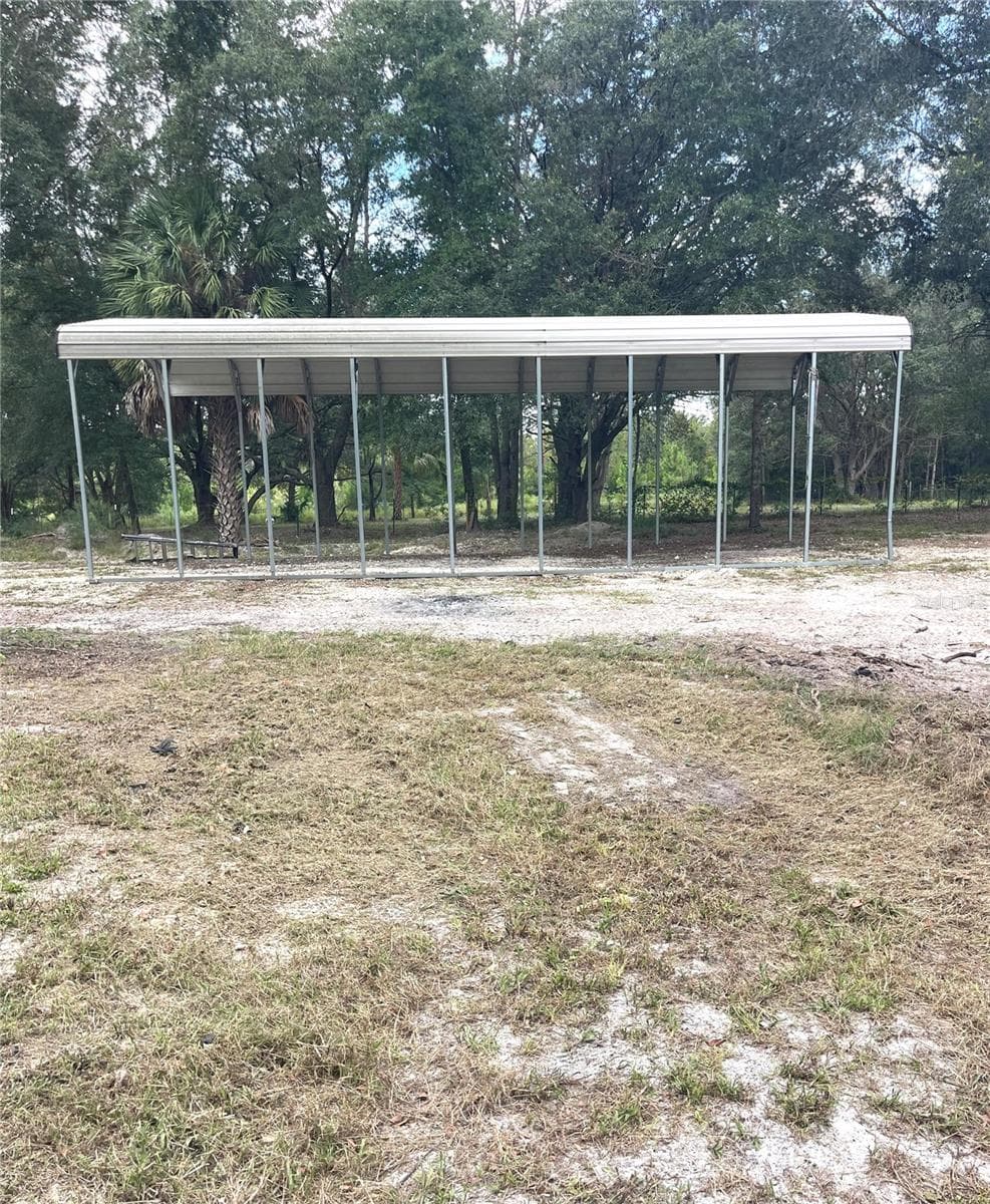 Side view RV cover - 7231 NW 28TH LN, CHIEFLAND