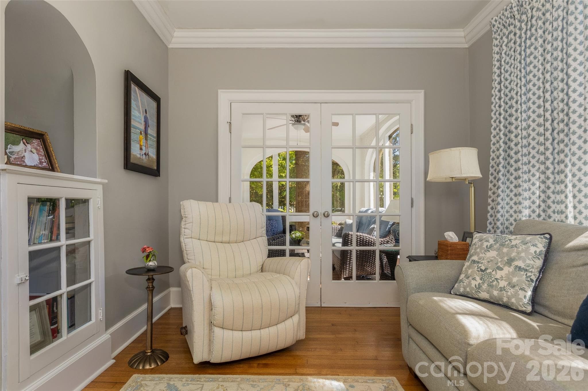 Sitting room with french doors into sunroom. - 200 Kimberly Avenue, Asheville