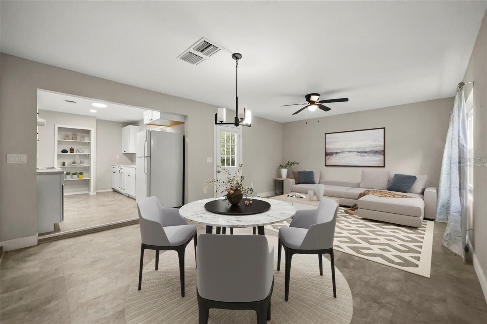 Virtually staged family room and dining room areas - 2410 ORANGE AVE, SANFORD