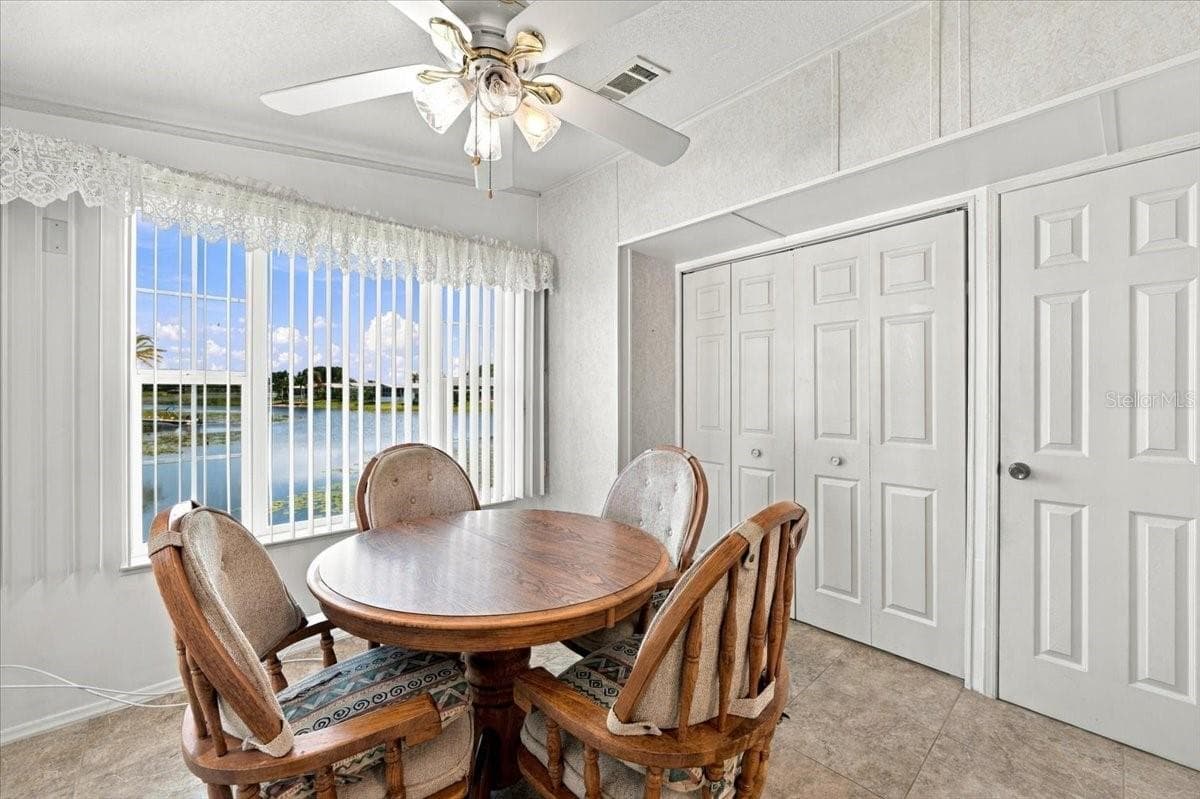 Dining Room with Laundry closet - 59 BEAVERKILL DR, LAKE WALES
