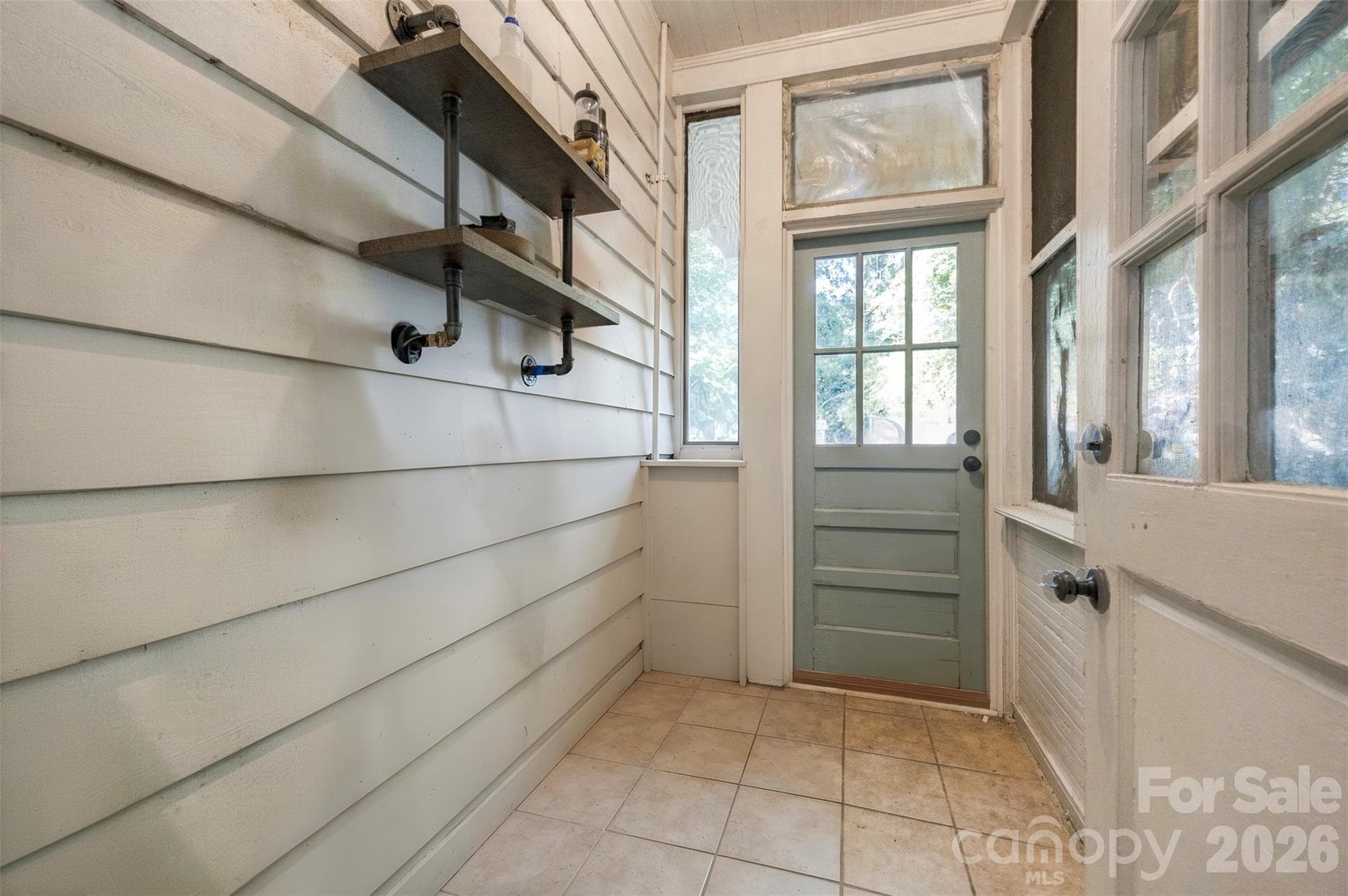 Mudroom leading to back yard - 407 S South Street, Gastonia