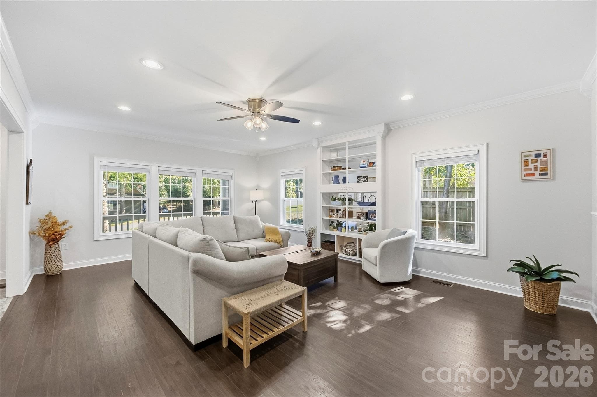 Living room with lots of windows for a bright and airy room - 109 Fulton Farms Lane, Mooresville