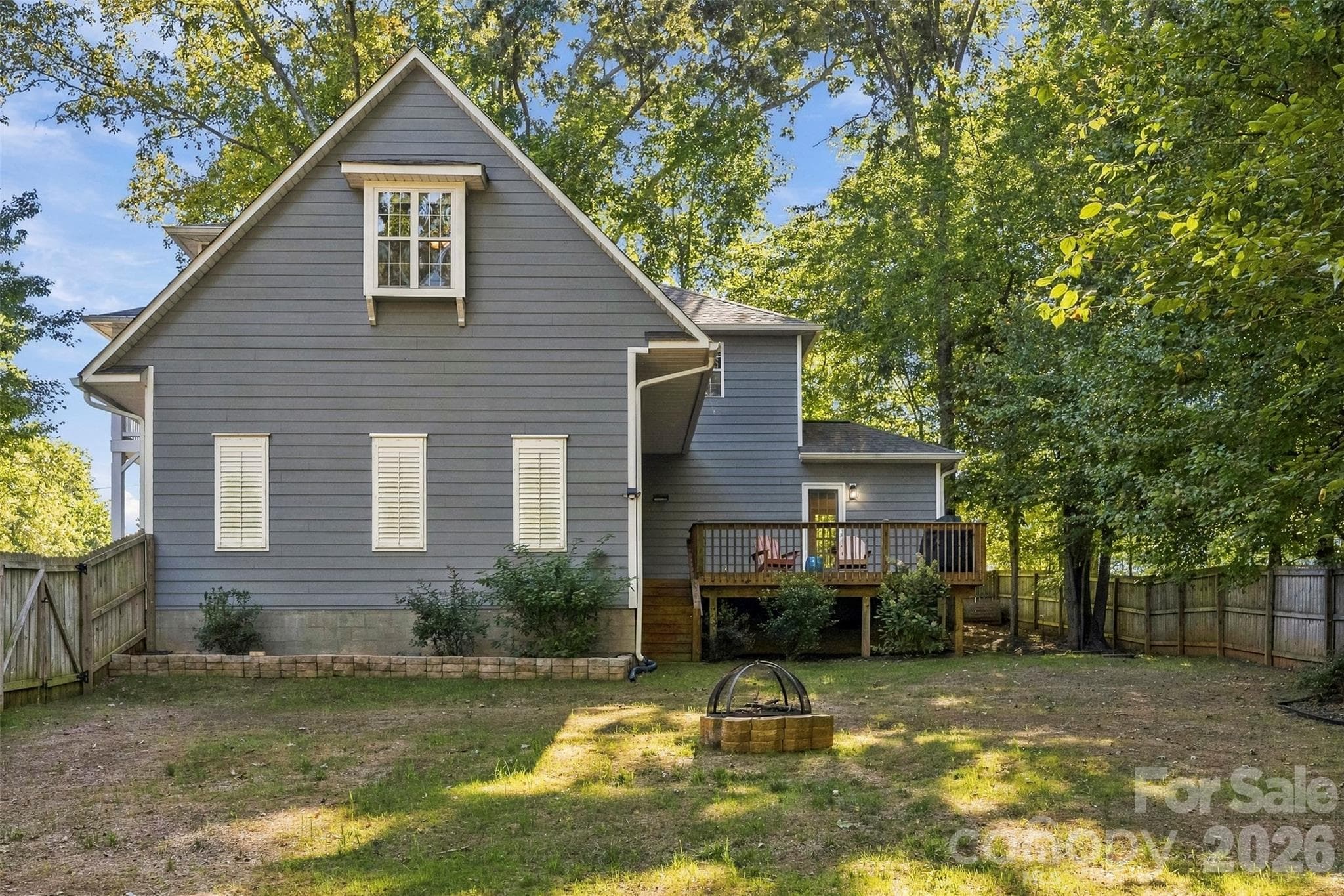 Back of home with deck - 109 Fulton Farms Lane, Mooresville