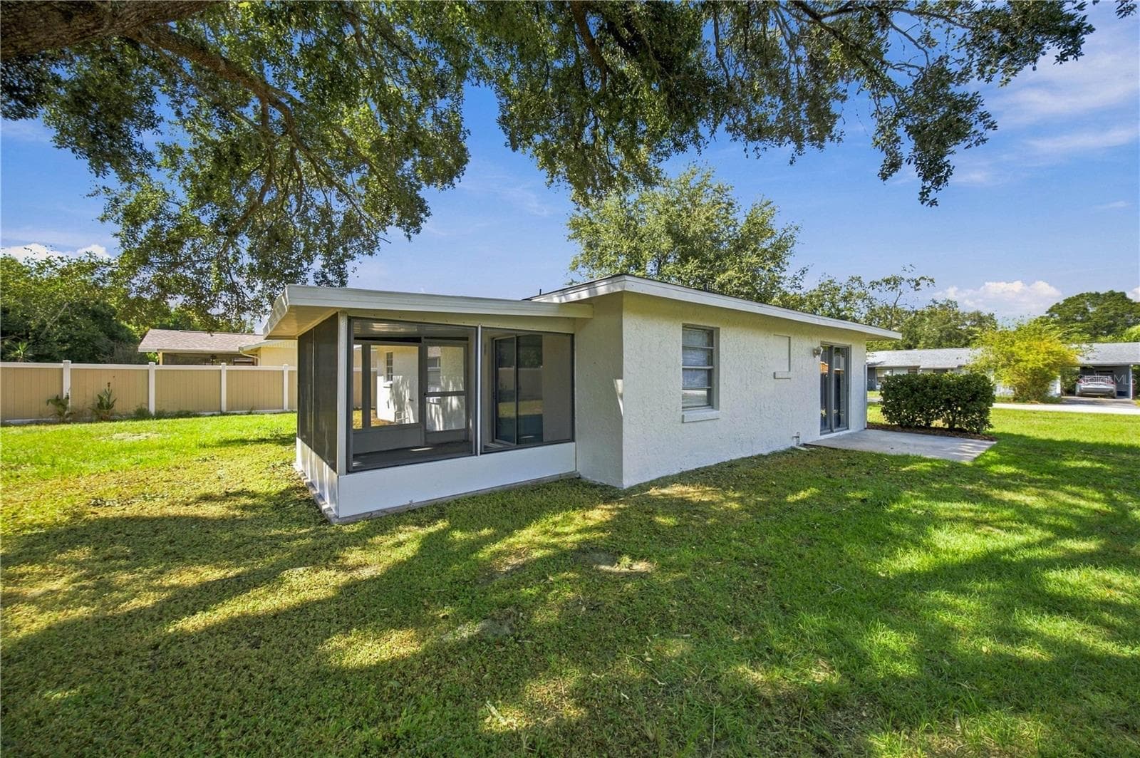 Back of Home - 21234 SW RAINTREE ST, DUNNELLON
